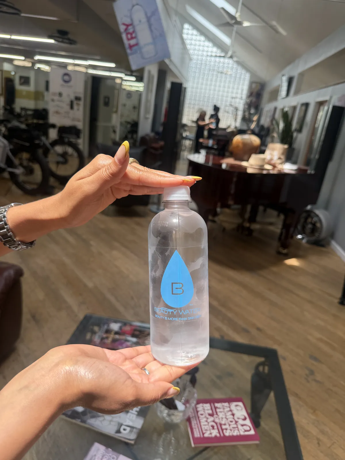 A Beauty Water customer with their bottle