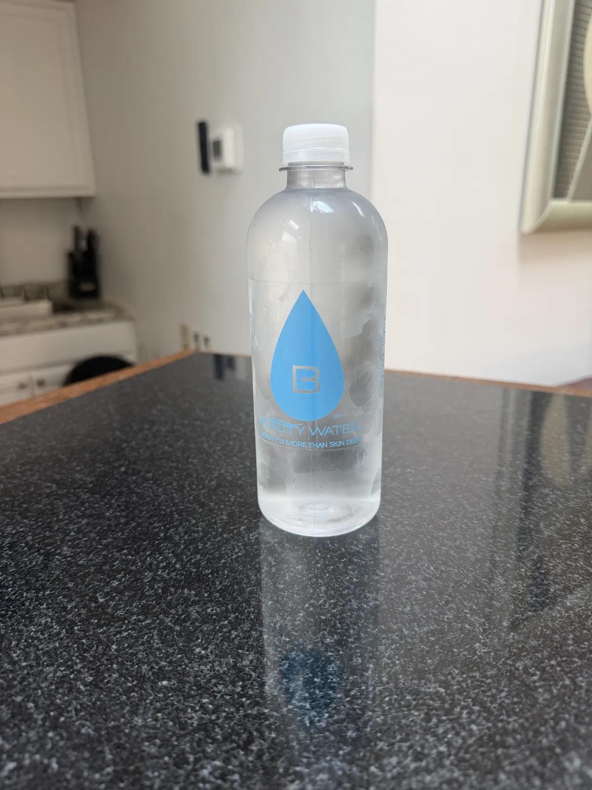 A Beauty Water customer with their bottle